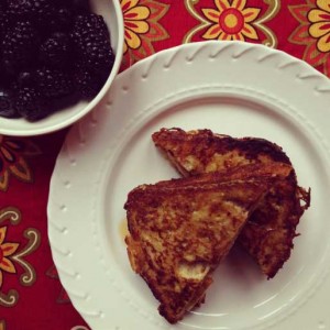 Stuffed French Toast with Peanut Butter and Bananas, and a bowl of Blackberries
