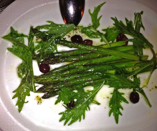 Warm Asparagus Provencal with Garlic, Olive Oil, Rosemary, and Black Olives at Lark Restaurant