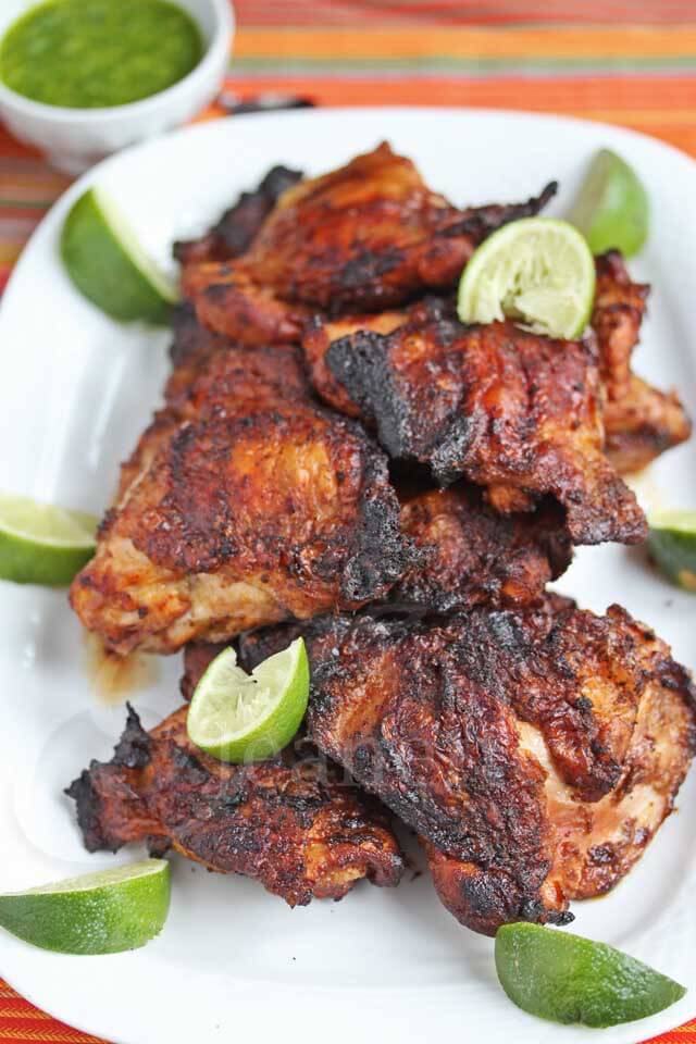 Smoked Grilled Peruvian Chicken - this chicken is bathed in a citrusy marinade and then smoked on the grill - incredibly delicious