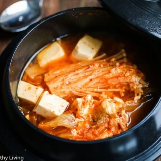 Spicy Kimchi Tofu Mushroom Egg Soup - this spicy vegetarian soup is healthy bowl of comfort on a cold winter day
