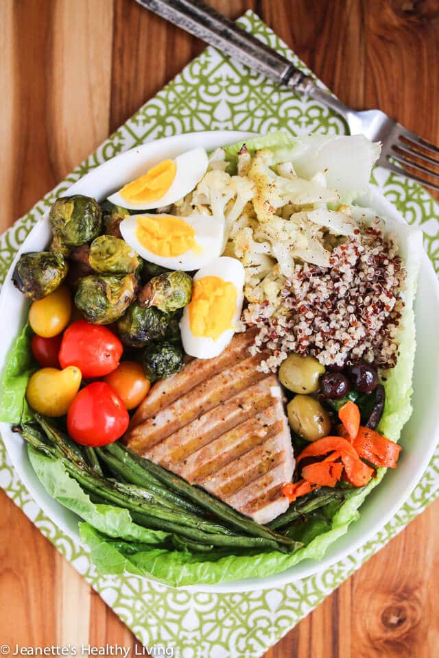 Winter Tuna Nicoise Salad with Quinoa and Roasted Vegetables - This one bowl meal is packed with protein and a rainbow of vegetables, served with a simple lemon vinaigrette
