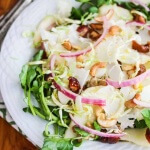 Shaved Cauliflower Salad with Pickled Onion Pears Brussels Sprouts Watercress Medjool Dates and Cashews - crunchy, juicy and sweet, this healthy salad is drizzled with a honey balsamic flax seed oil dressing