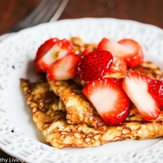 Gluten-Free Swedish Pancakes with Fresh Strawberries and Honey - these thin pancakes are so tender, they practically melt in your mouth