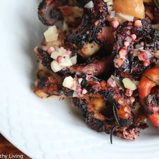 Grilled Greek Octopus - tender and flavorful, this octopus is marinated in olive oil infused with garlic, rosemary and thyme
