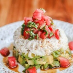 Crabmeat Avocado Tomato Basil Appetizer with Wasabi Soy Dressing - impress your guests with this beautiful presentation. The wasabi soy dressing spices things up a bit