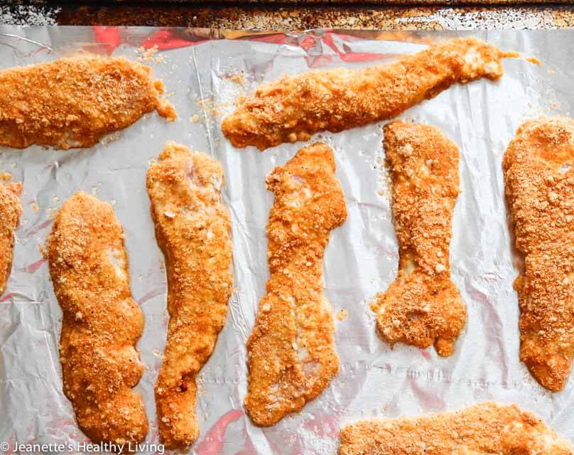 Gluten-Free Spicy Baked Chicken Tenders with Secret Sauce - creole seasoning spices up these chicken tenders and the sweet and tangy secret sauce is the perfect way to cool them down