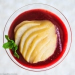 Vanilla Pear Raspberry Panna Cotta - so light and creamy, this elegant dessert is low-fat, made with cashew milk and Greek yogurt. Vanilla poached pears and raspberry puree are the perfect match.