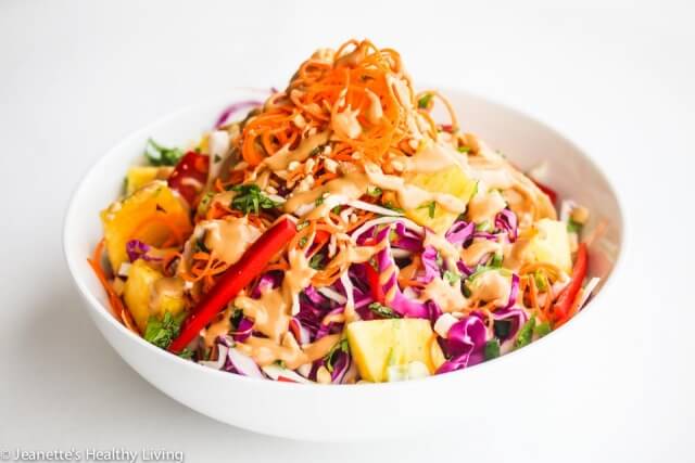 Asian Slaw with Spicy Peanut Salad Dressing - this healthy salad is full of crunch and the spicy peanut salad dressing adds a punch of flavor!
