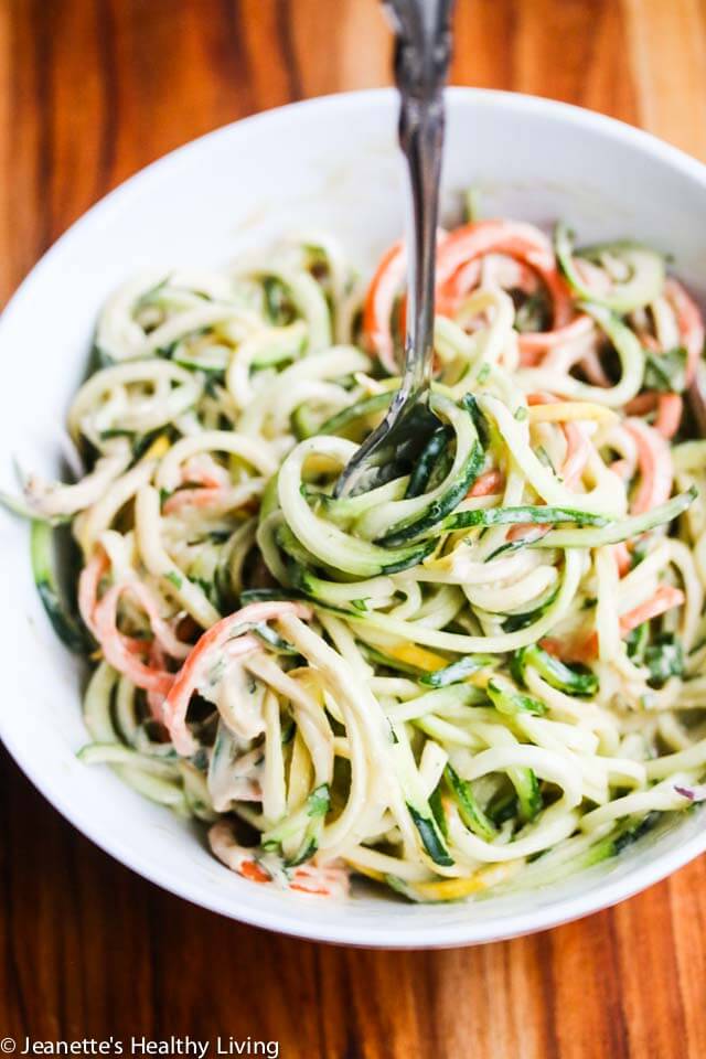 Zucchini Noodles with Sunflower Seed Butter Dressing - this dressing is SO delicious! Made with sunflower seed butter and coconut milk, it is rich and creamy.