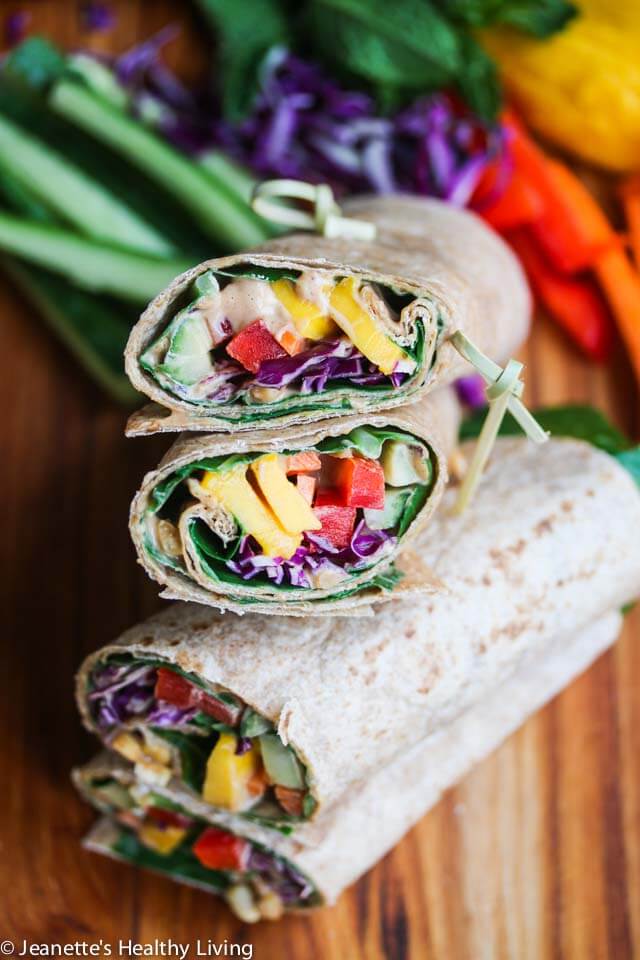 Rainbow Vegetable Wraps with Peanut Sauce - these portable sandwiches are perfect for lunch or an afternoon snack - full of veggies, juicy mango, fresh mint and a delicious peanut sauce!