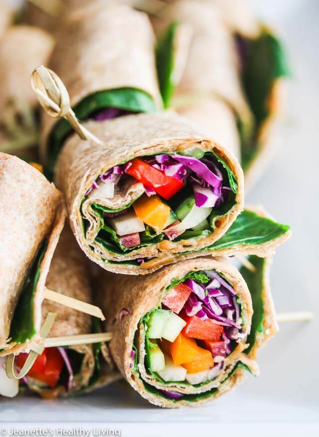 Rainbow Vegetable Wraps with Peanut Sauce - these portable sandwiches are perfect for lunch or an afternoon snack - full of veggies, juicy mango, fresh mint and a delicious peanut sauce!