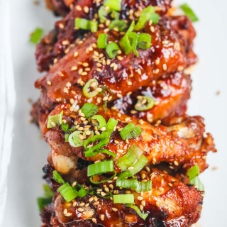 Baked Korean Gochujang Chicken Wings - these wings are sweet, spicy and perfect for a party. You can oven bake them or grill them - the marinade is the key