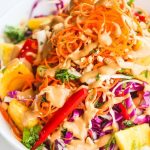 Asian Slaw with Spicy Peanut Salad Dressing - this healthy salad is full of crunch and the spicy peanut salad dressing adds a punch of flavor!