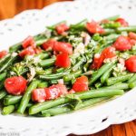 Green Bean Tomato Salad with Maple Basil Dressing - the sweet and tangy dressing helps bring out the best flavor in this summer green bean salad