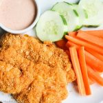 Spicy Baked Chicken Tenders with Secret Sauce - creole seasoning spices up these chicken tenders and the secret sauce is the perfect way to cool them down